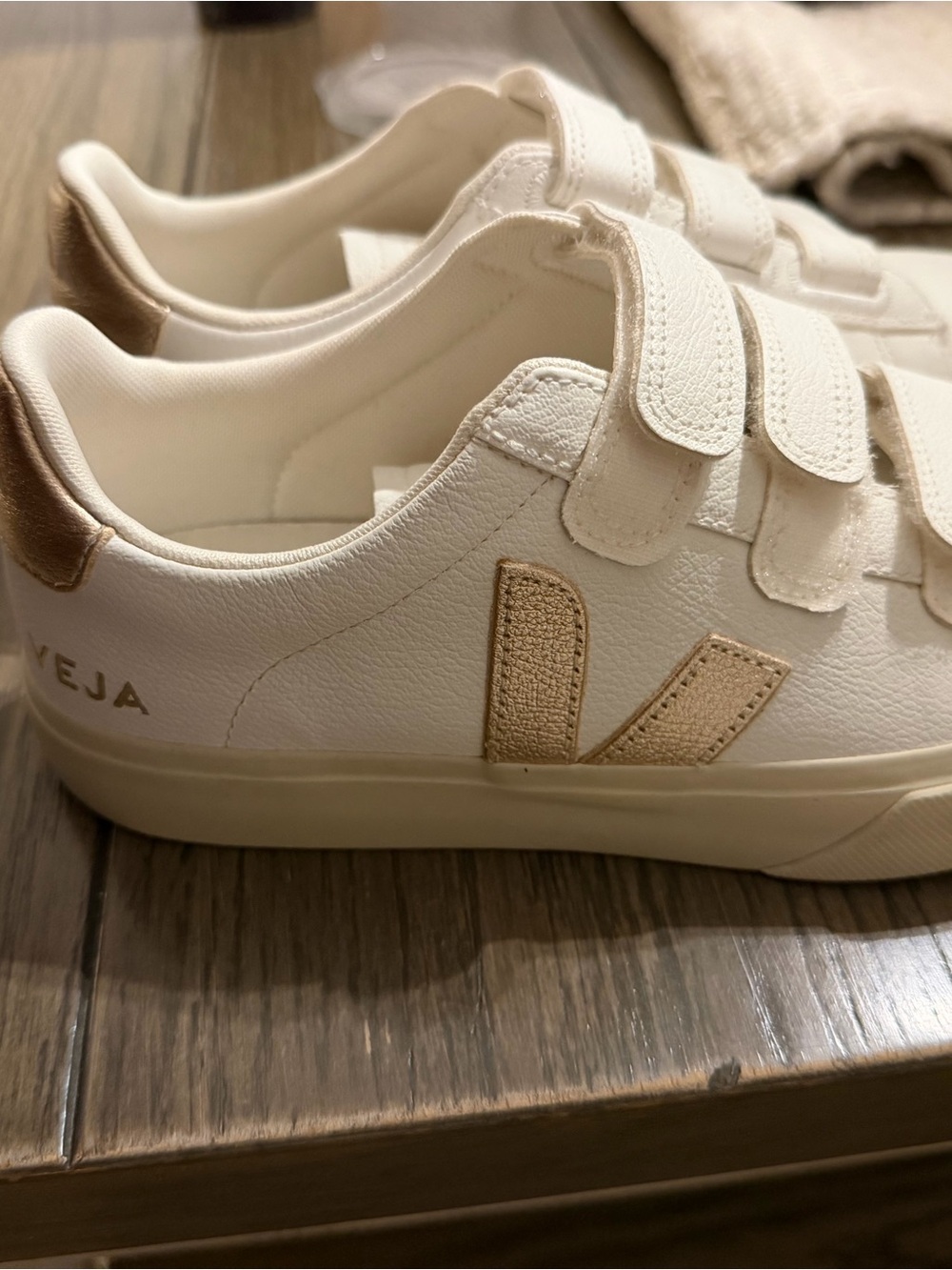 Veja women’s White and Gold Velcro Sneakers